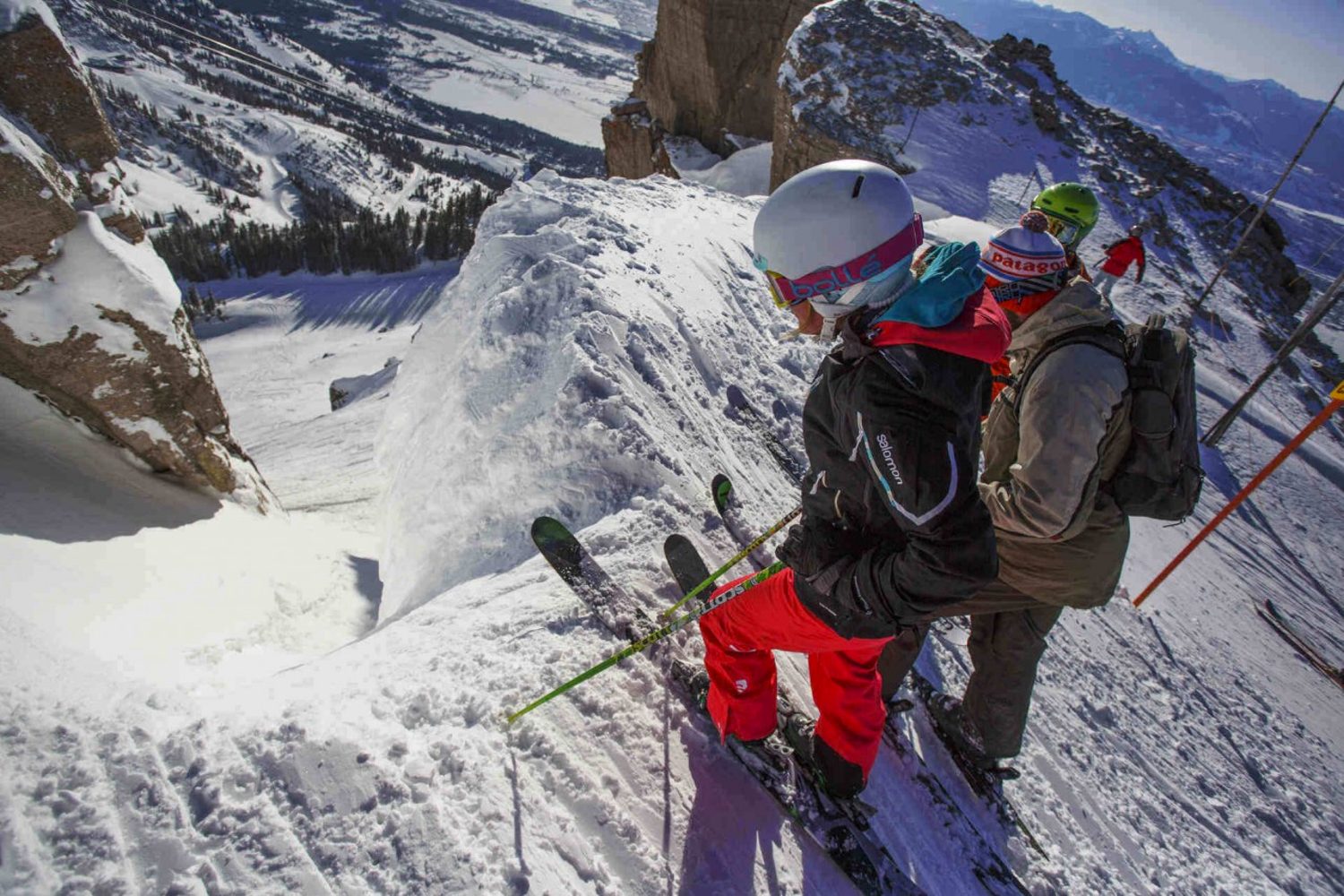 Skiiers look down Corbet's Couloir
