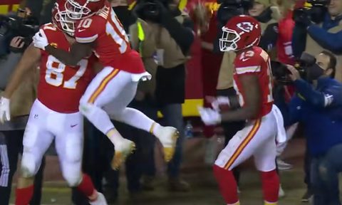 Kansas City Chiefs wide receivers Tyreek Hill (11) and Byron Pringle mob Travis Kelce (87) and Kelce caught the game-winning touchdown.