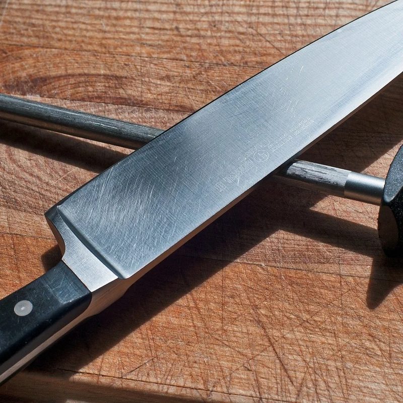 Kitchen knife being sharpened.
