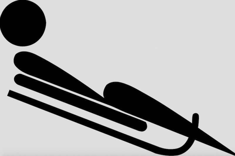 Symbol of winter olympics luge.