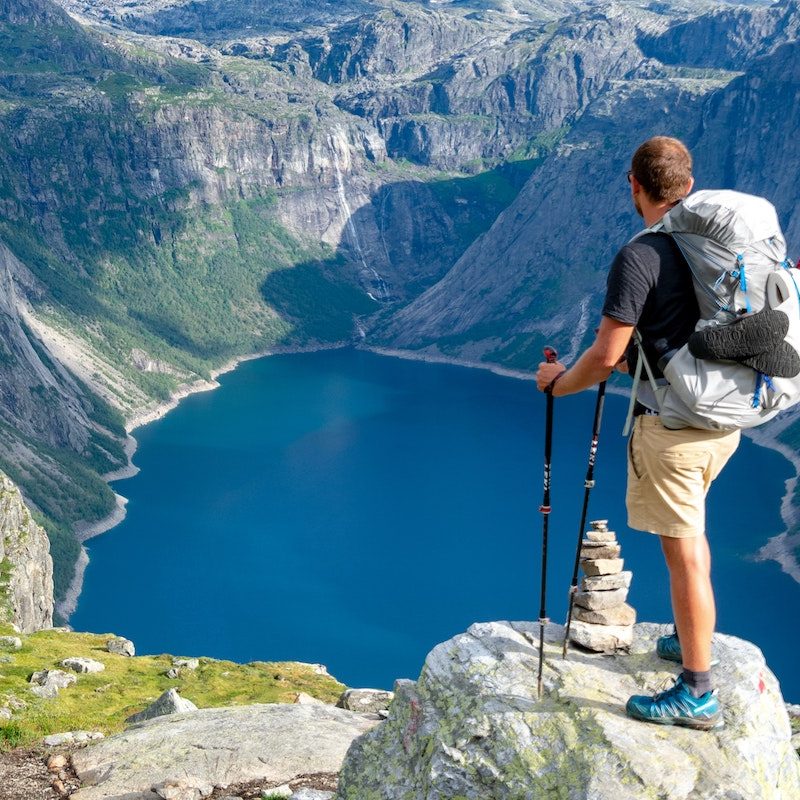A man hiking with gorgeous lake view