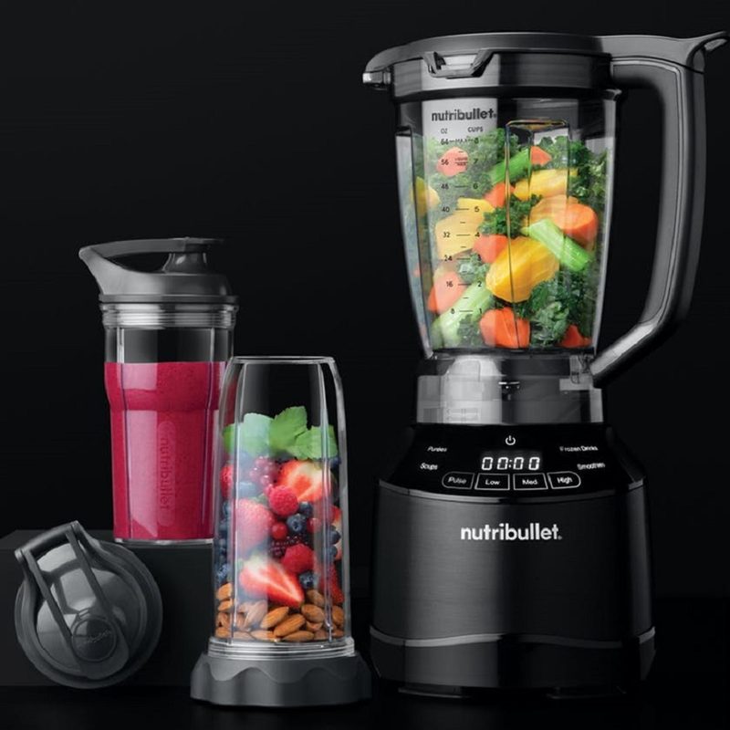 The Nutribullet Smart Touch Blender Combo with ingredients inside.
