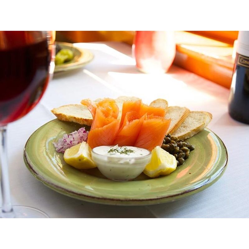 Plate of food, glass of wine at Santiago's Bodega