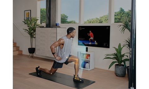A man using Tempo Move in front of his TV.