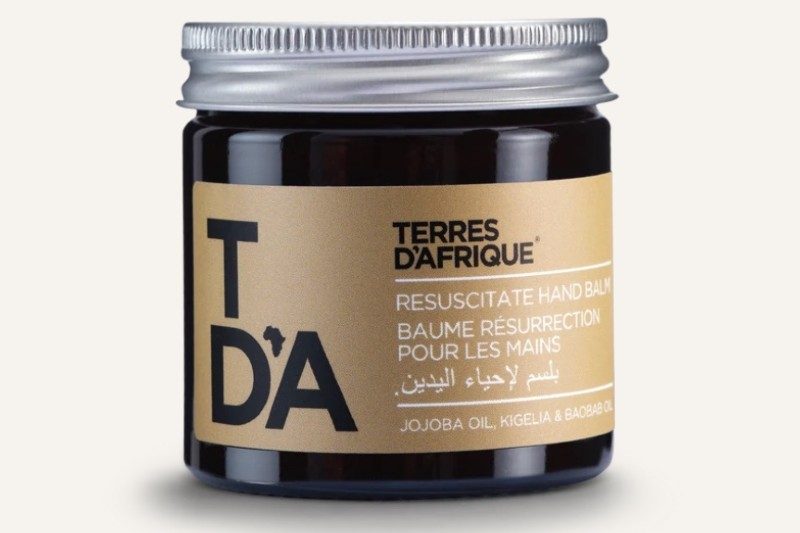 A sealed pot of Terres D’Afrique hand cream.