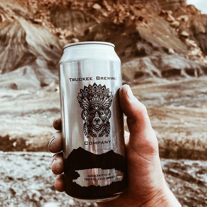 Truckee Brewing can in hand.