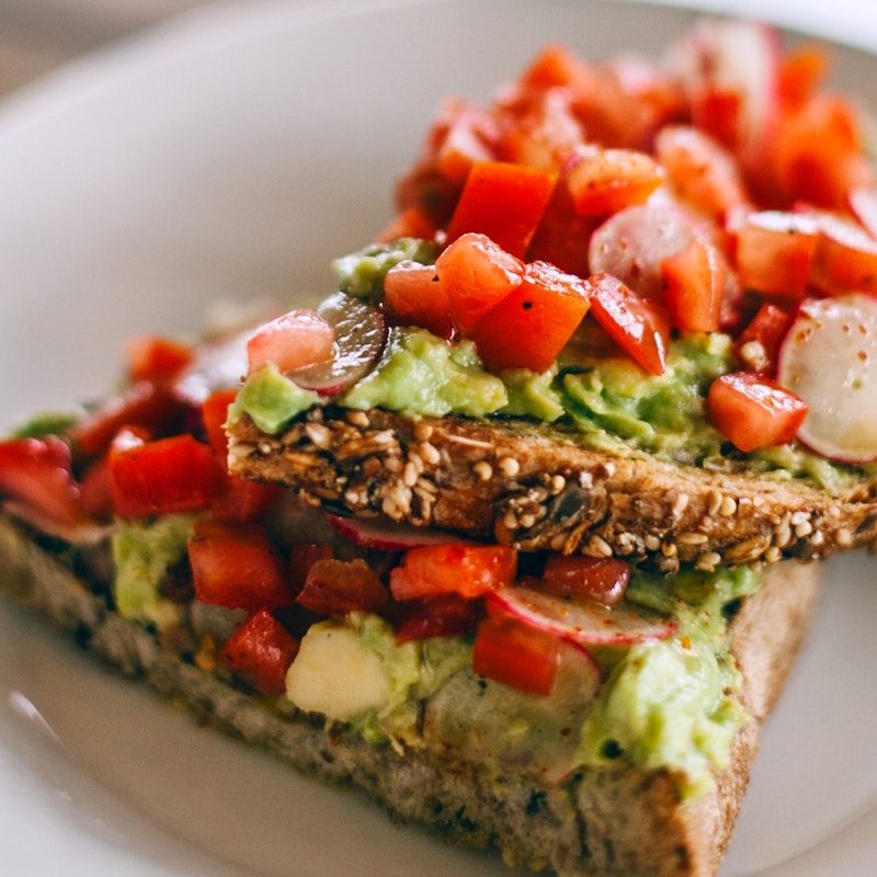 Vegan toast with tomato and avocado