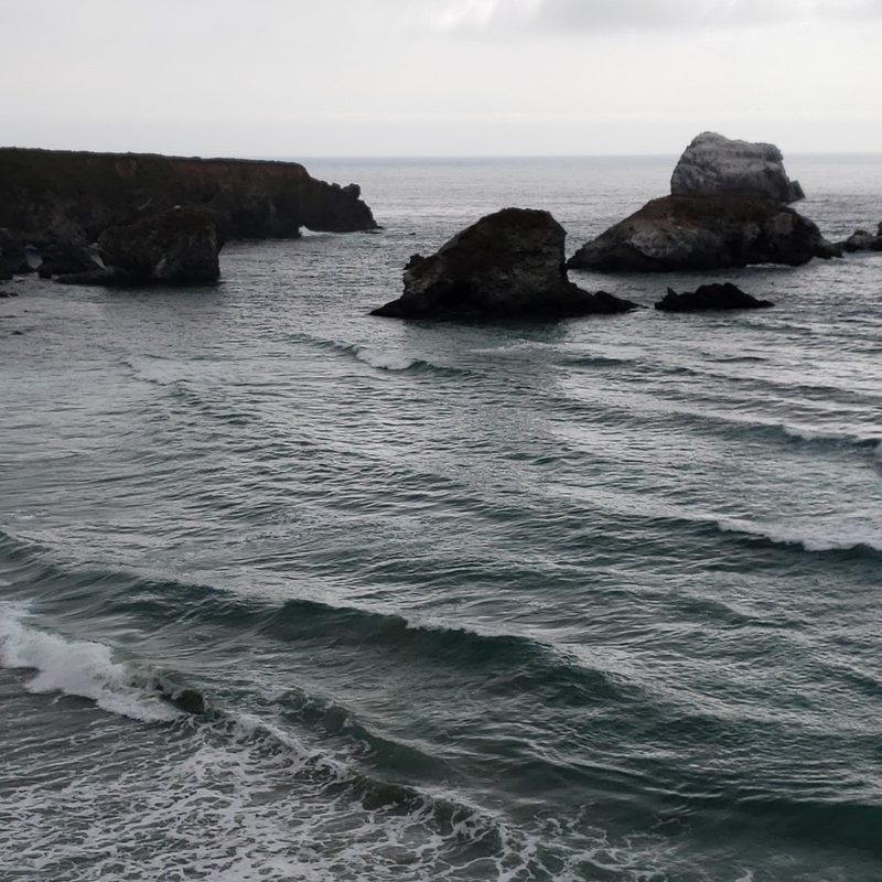 A view of the waves and the rocks at Sand Dollar Beach in Big Sur, California.