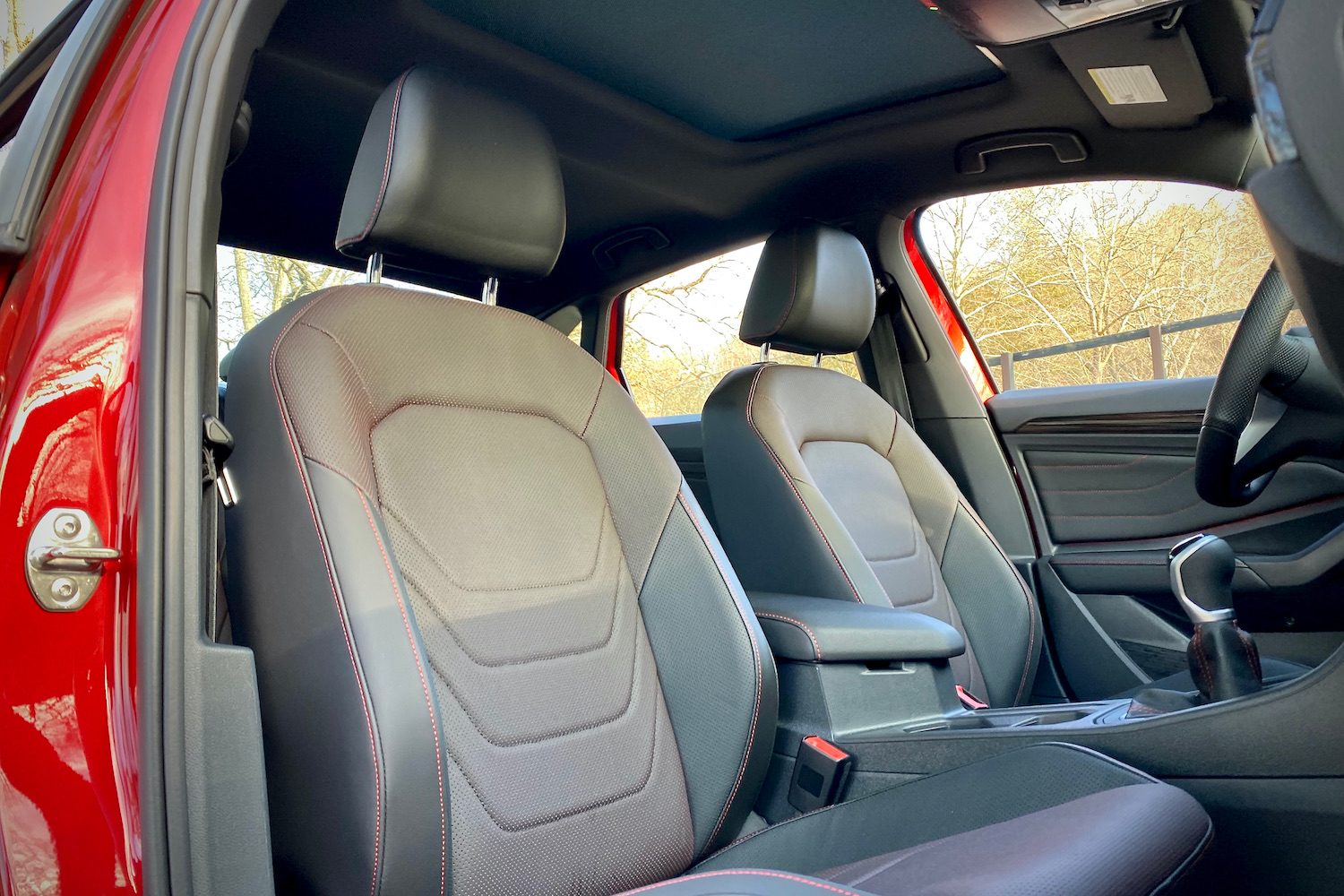 2022 Volkswagen Jetta GLI close up of front passenger seat from outside.