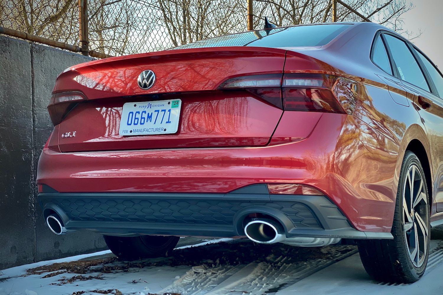 Close up of 2022 Volkswagen Jetta GLI rear end from passenger side.