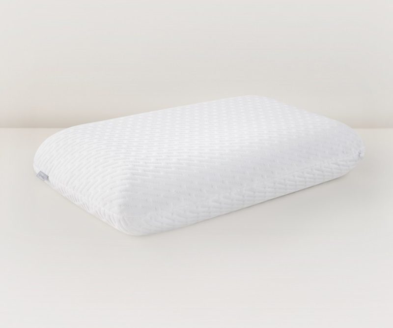 The Tuft & Needle foam pillow against a cream background.