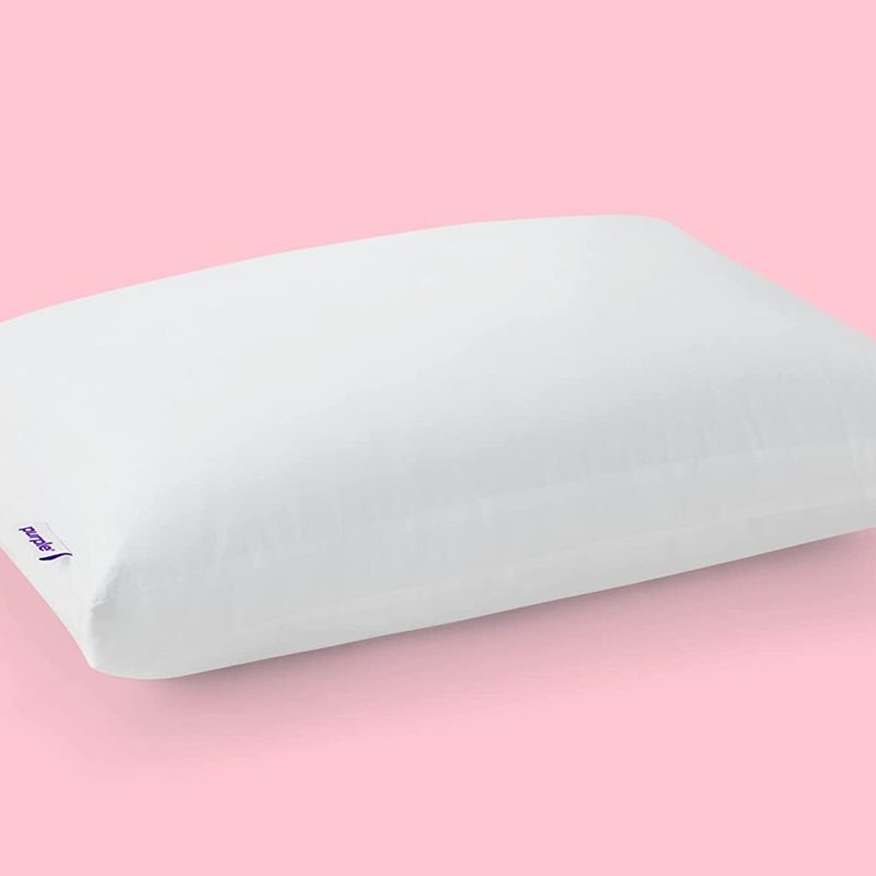 Purple Cloud Pillow on pink background.