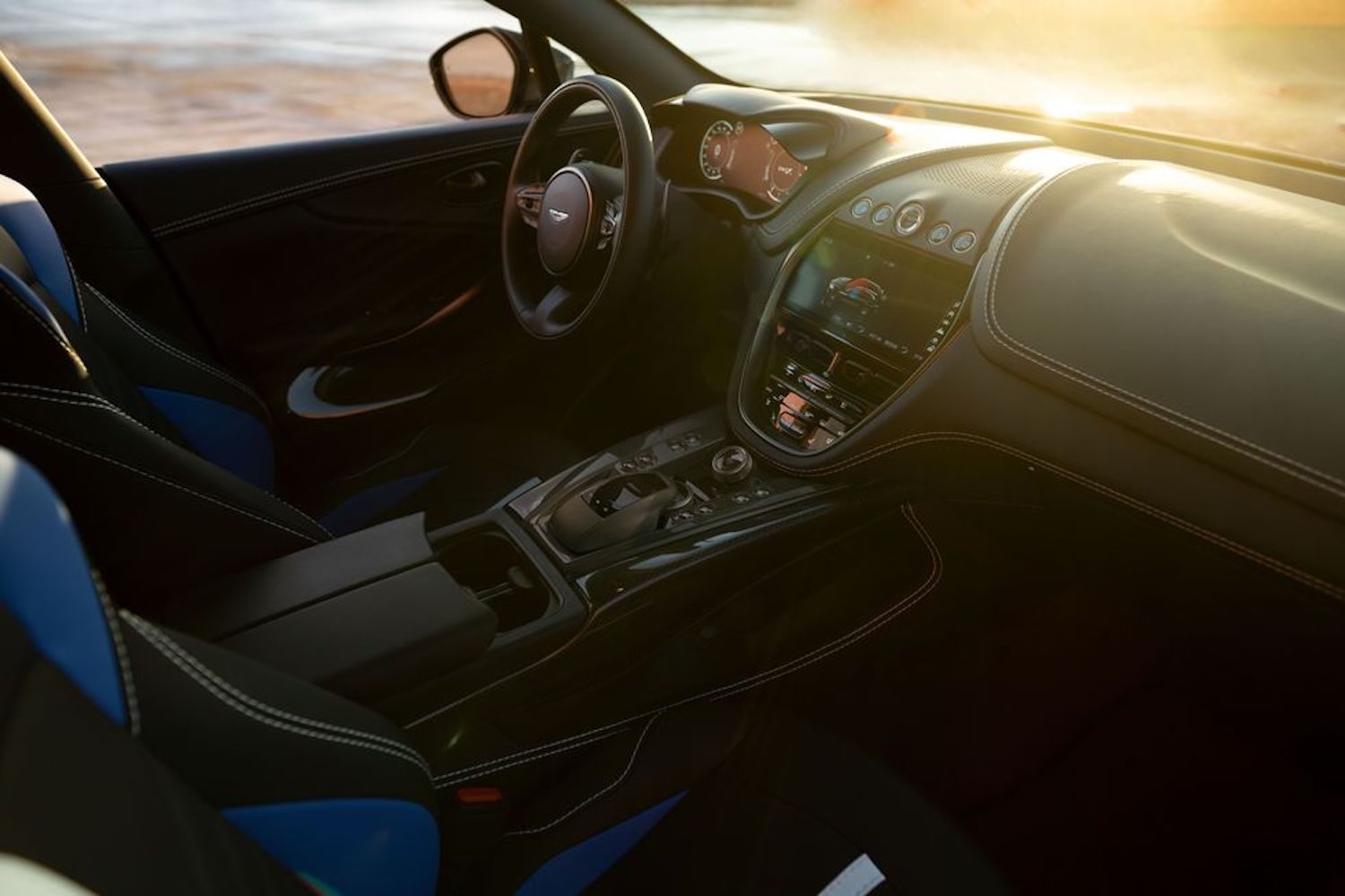 Aston Martin DBX 707 dashboard from passenger's side in daylight.