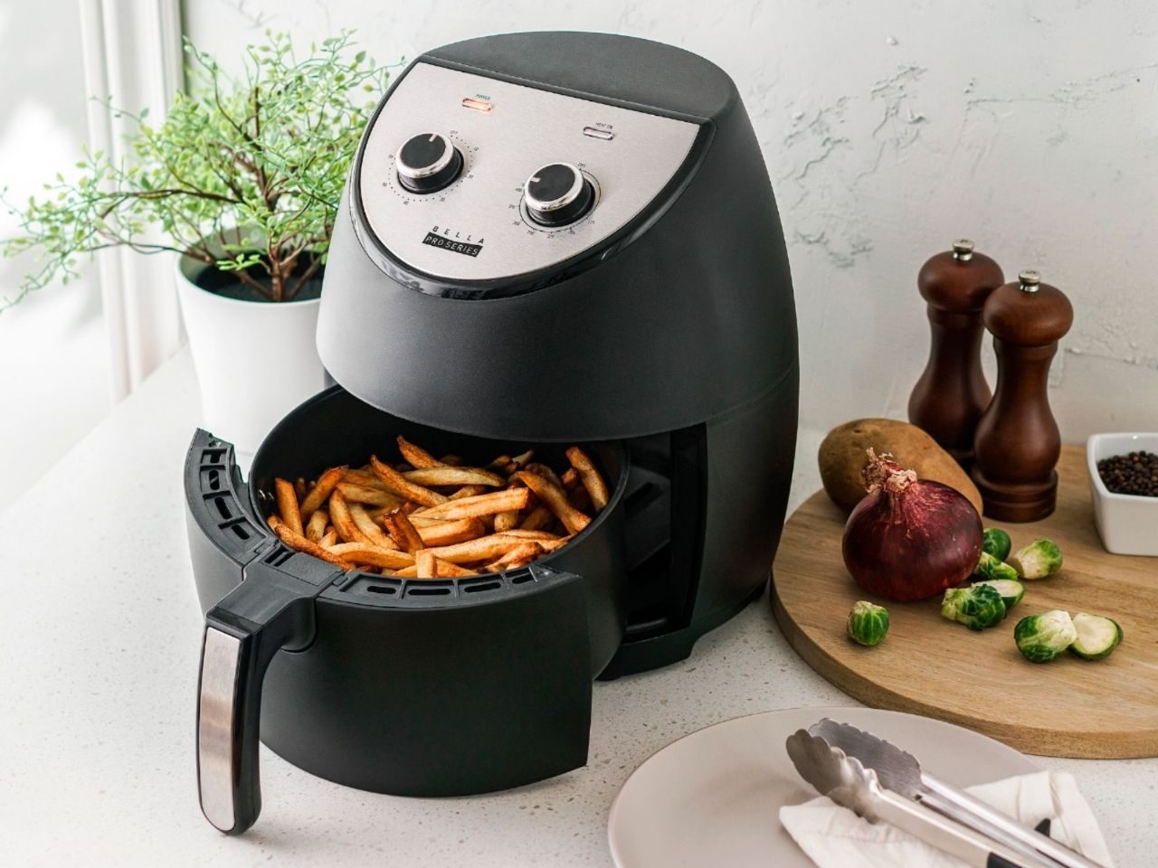 Bella Pro Series 4.2-quart air fryer with fries inside.