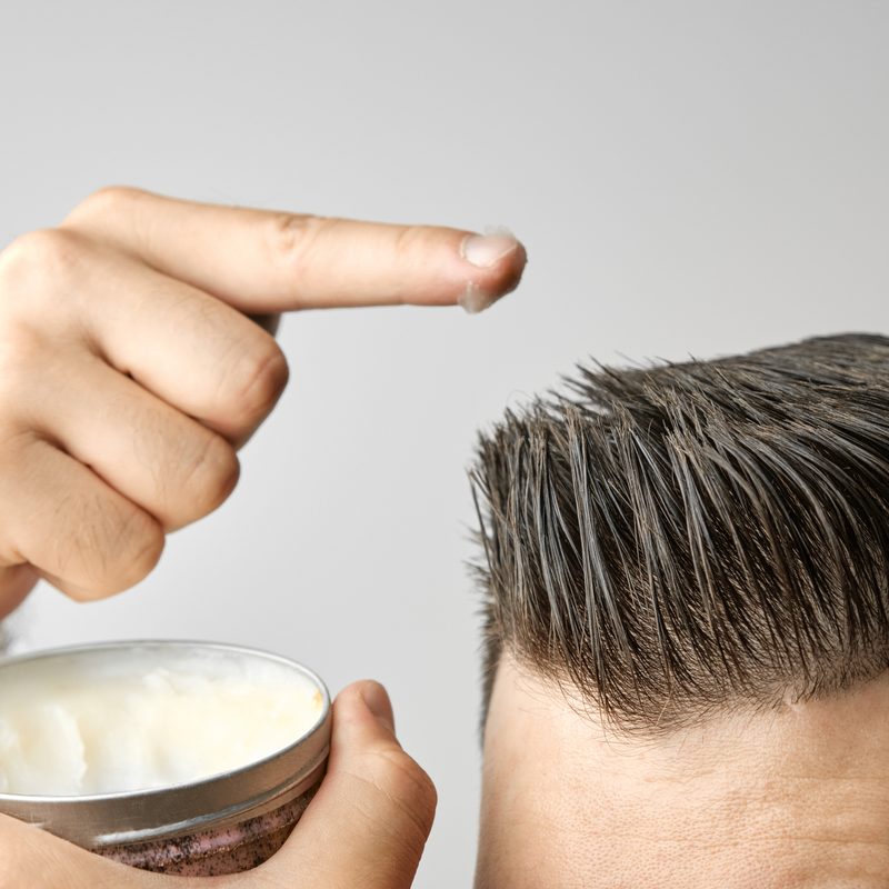 Man applying pomade