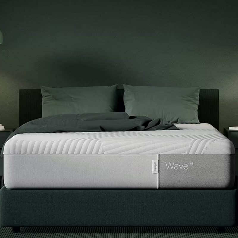 Casper Wave Hybrid mattress queen size on a platform.
