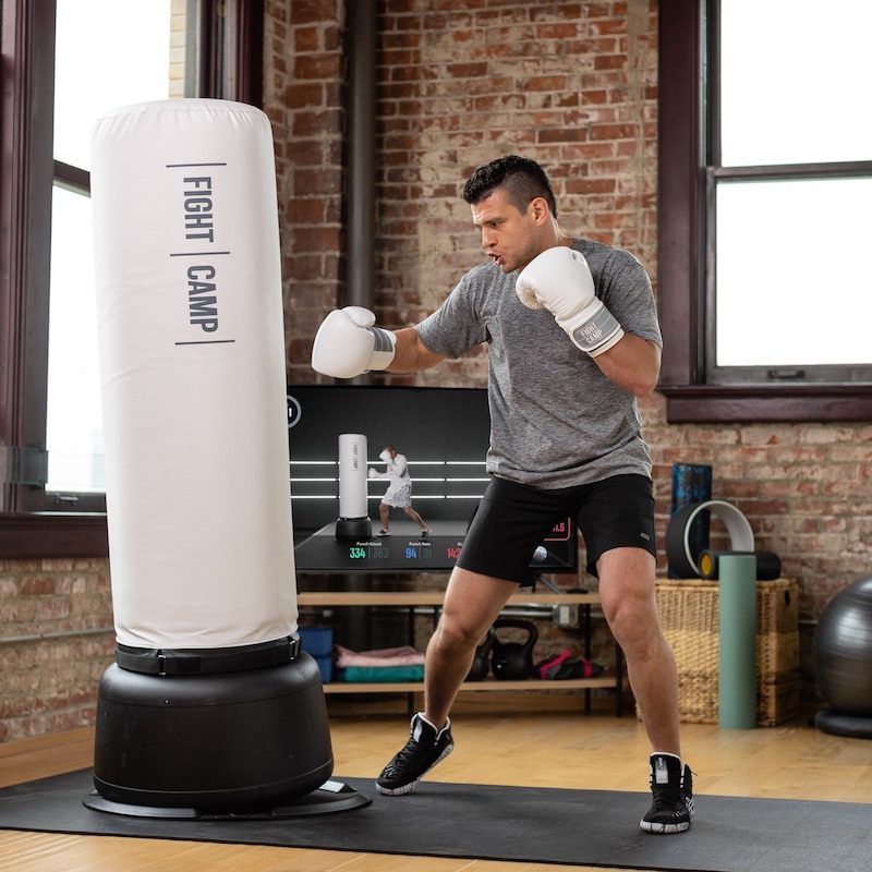 Man boxing with FightCamp workout.