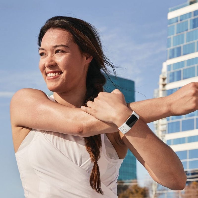Fitbit Charge on a black band.