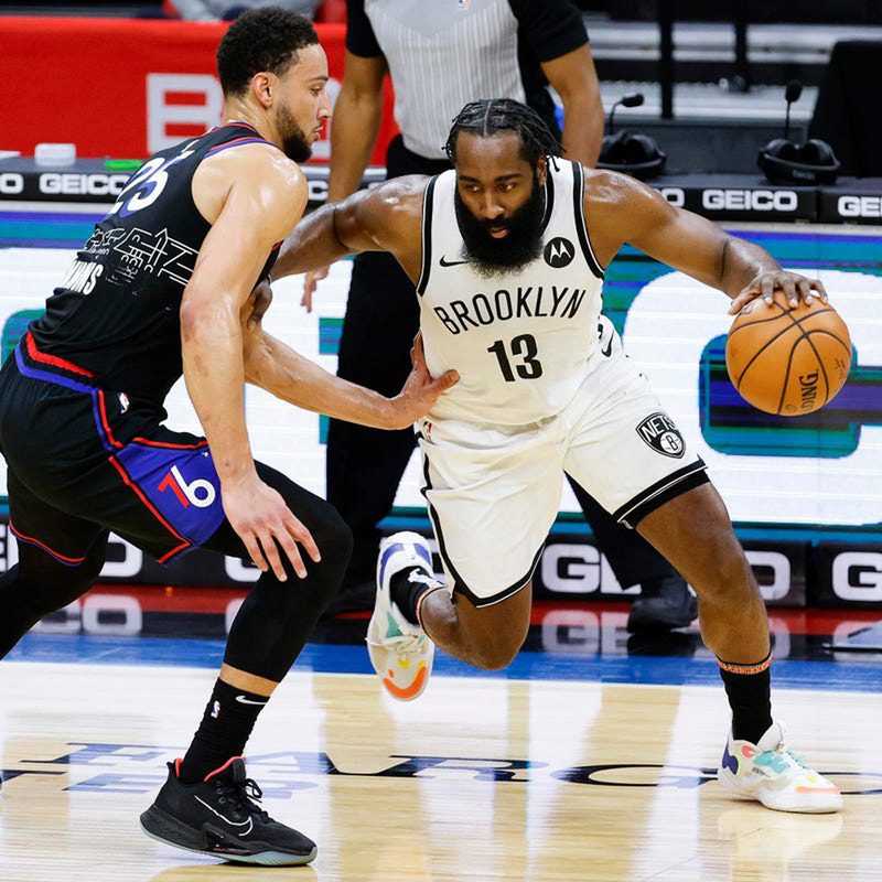 James Harden and Ben Simmons during an NBA match.