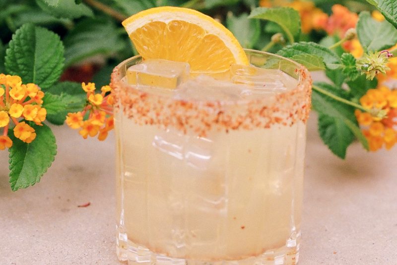 Kendall Jenner Margarita displayed next to greenery.