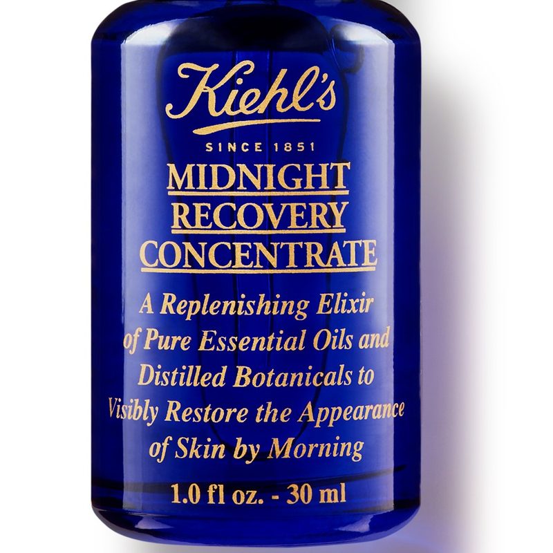 A bottle of Kiehl's Midnight Recovery face serum.