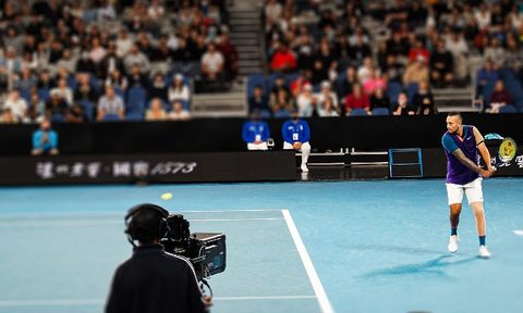 Kyrgios playing at the 2021 Australian Open.