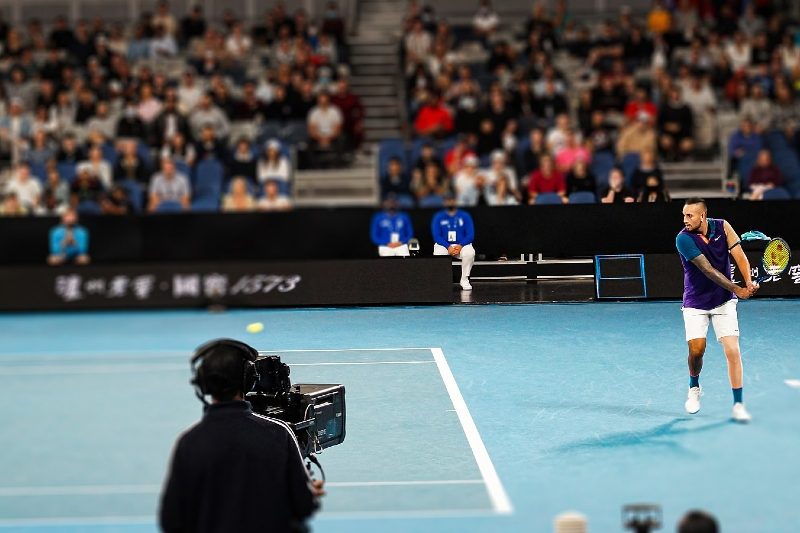 Kyrgios playing at the 2021 Australian Open.