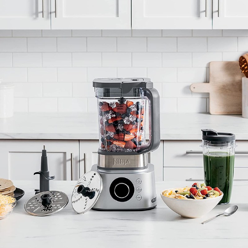 Ninja Foodi Ultimate System on a white marble kitchen counter.