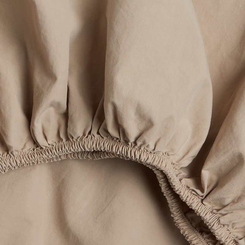 A close-up of Parachute's brown cotton sheet.