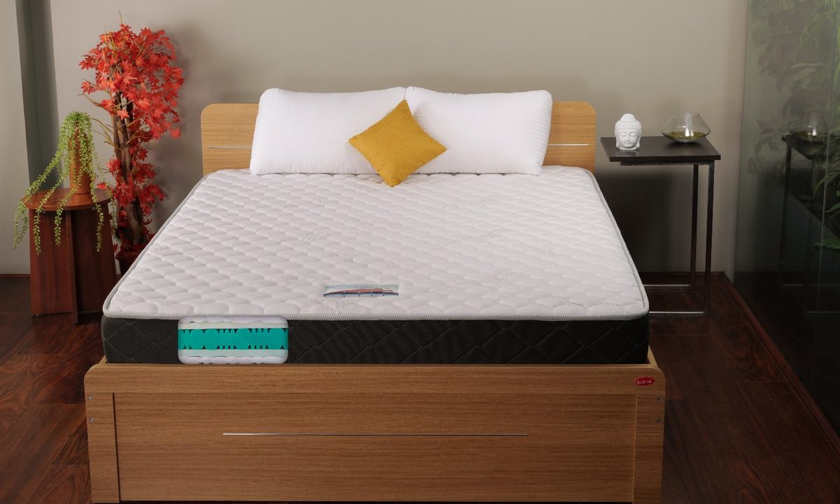 A memory foam mattress in a bedroom.