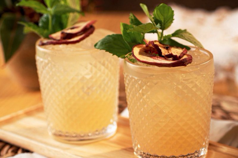 Two Spanish Peach Margaritas in glasses.