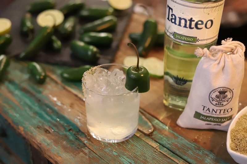Tanteo Jalapeno Margarita next to a Tenteo tequila bottle.