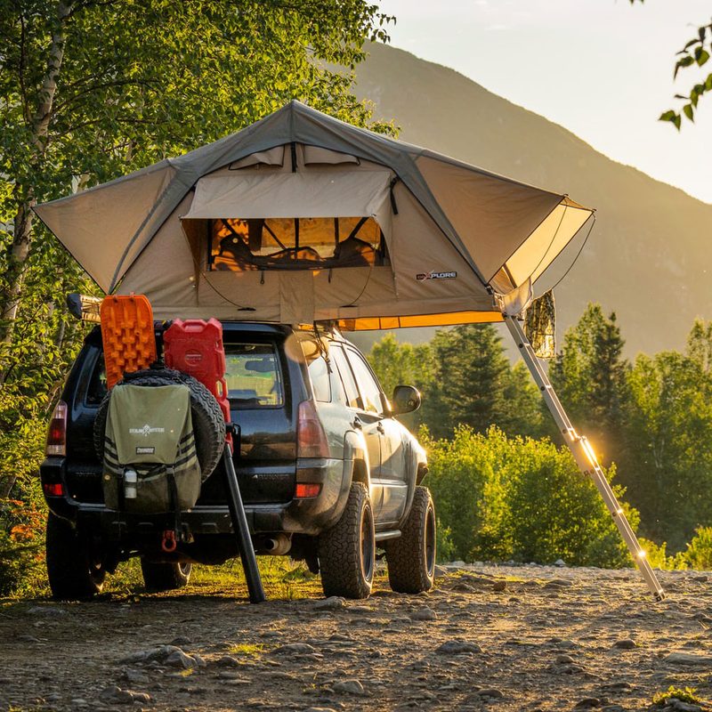 Toyota 4Runner overlanding with a rooftop tent.