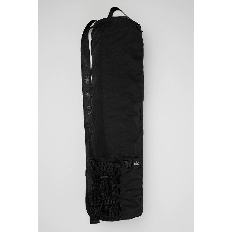 Alo Yoga Utility Mat Bag Black on plain background.