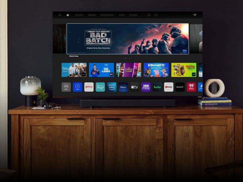 Vizio 70-inch M7 4K TV on TV table.