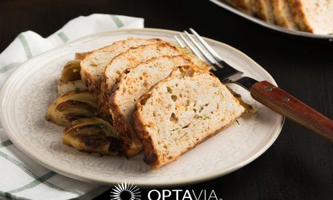 Meatloaf slices with metal fork on a towel with "Optavia" below it.