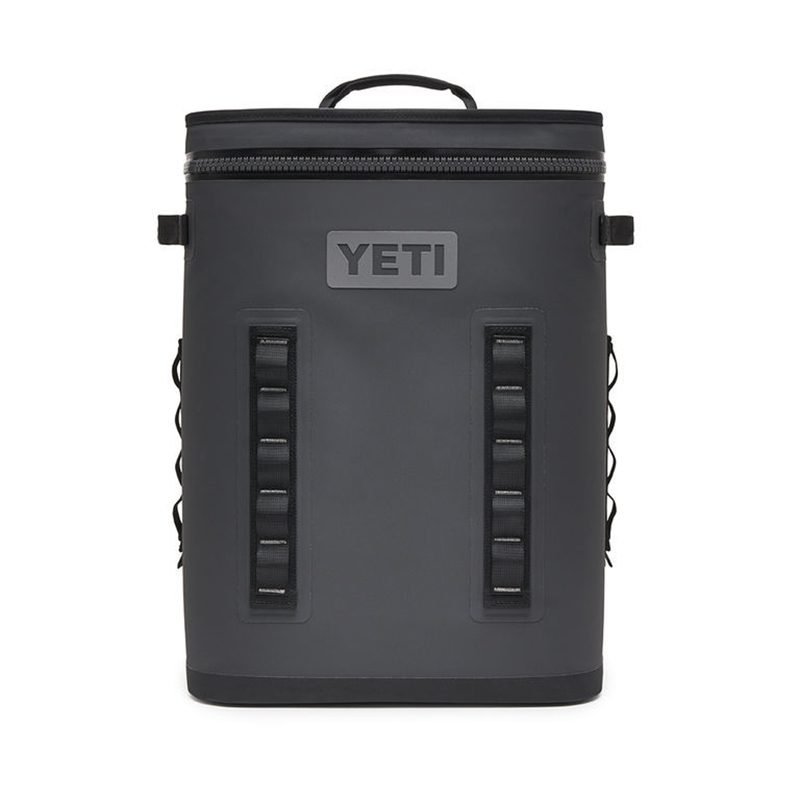 A gray Yeti backpack cooler on white background.