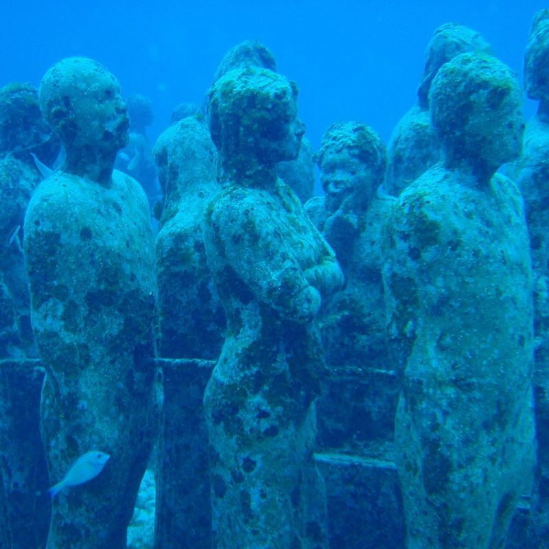 A group of sculptures at the Underwater Museum of Art (MUSA) off the coast of Cancun, Mexico.