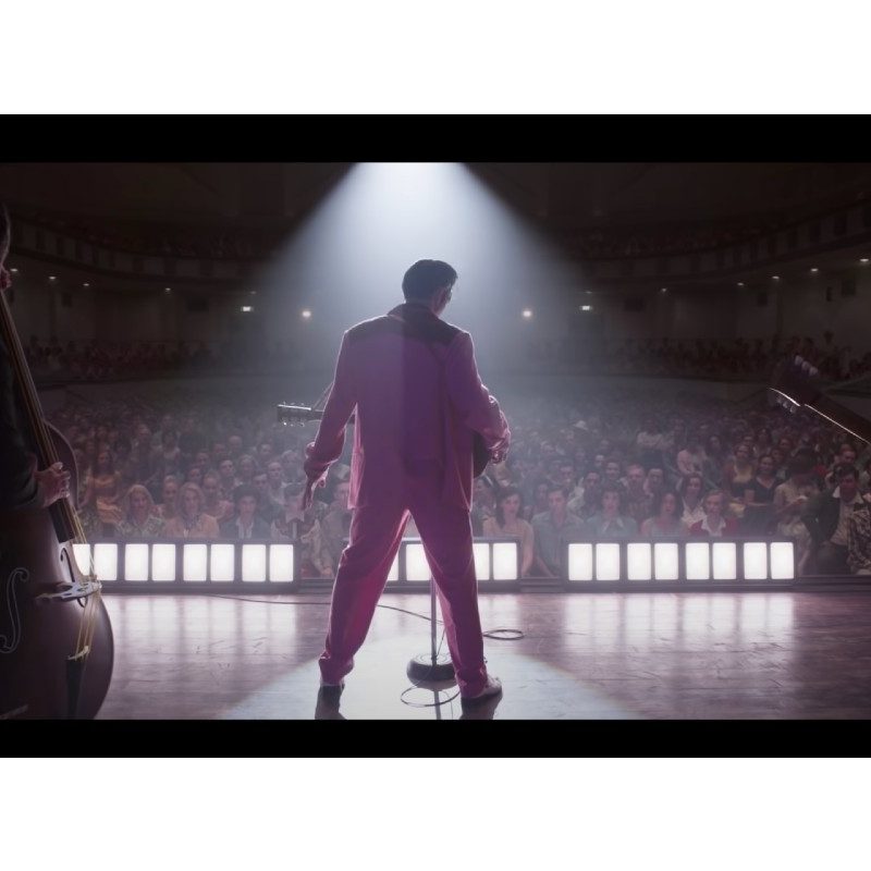 A screen of Austin Butler as the King in the preview for the 'Elvis' movie