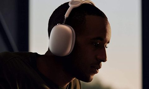 A man listening to headphones.