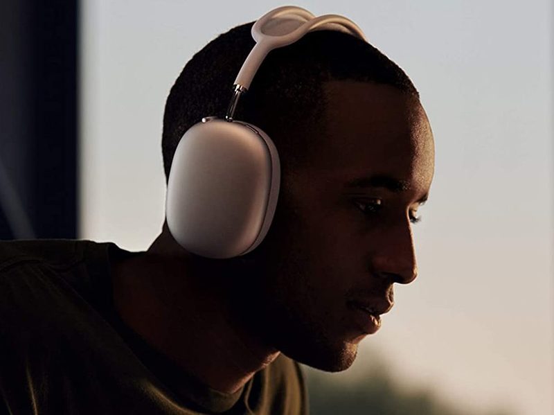 A man listening to headphones.