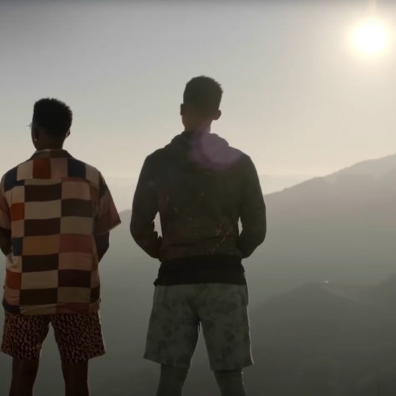 Jazz and Will Smith look out over the greater L.A. valley in Peacock's reboot, 'Bel-Air.'