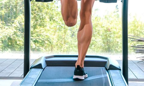 Woman running on Bowflex BXT6 treadmill.
