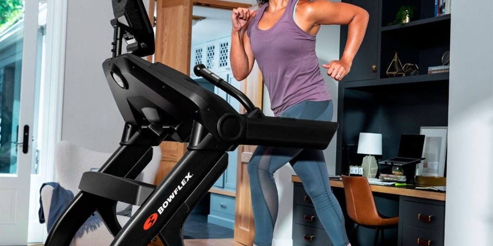 A woman running on a Bowflex Treadmill 10.