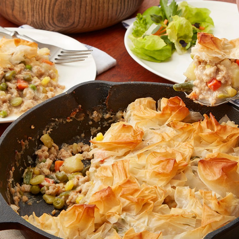 Perdue Chicken Shepard pie in a black skillet dish.