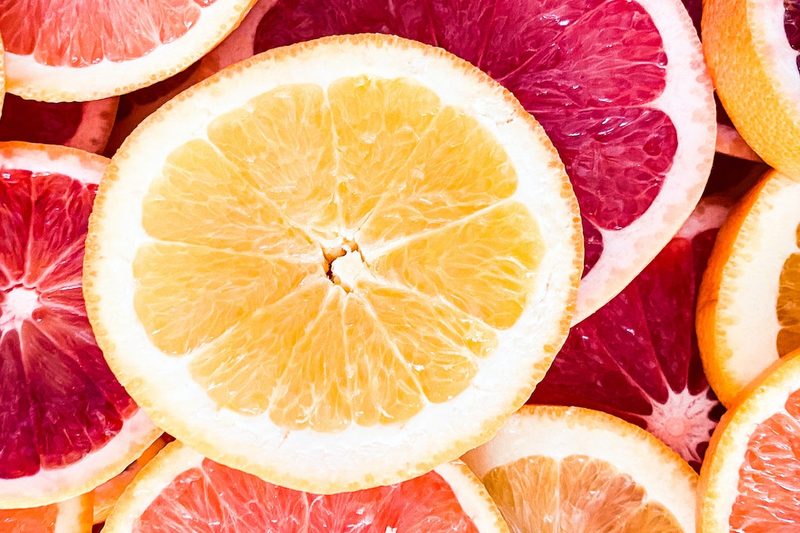 Oranges and grapefruits sliced.