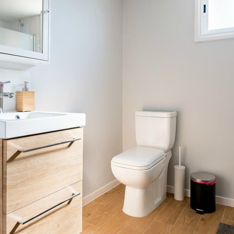 Sparkling clean bathroom sink and toilet