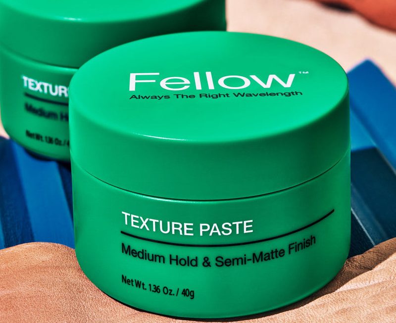 Two containers of Fellow Barber Texture Paste.