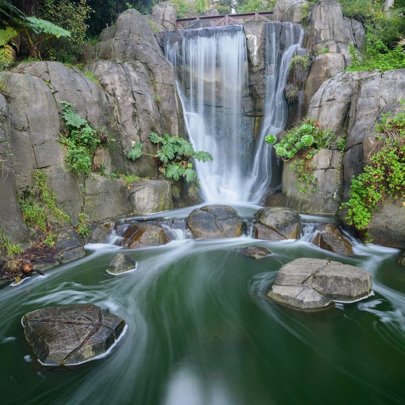 The Huntington Falls waterfall at Golden Gate Park in San Francisco, California.