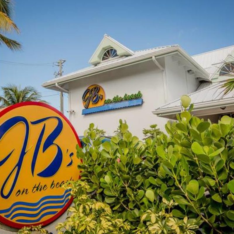 The JB's sign and bushes in front of the restaurant.